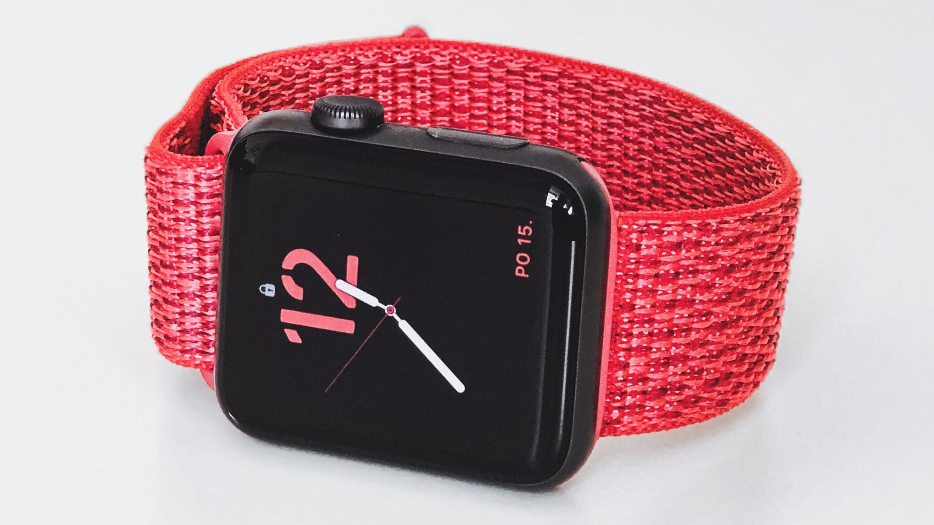 Space gray apple watch with Red Sport Loop