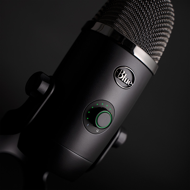 The Blue Yeti X with smart knob and green lights visible